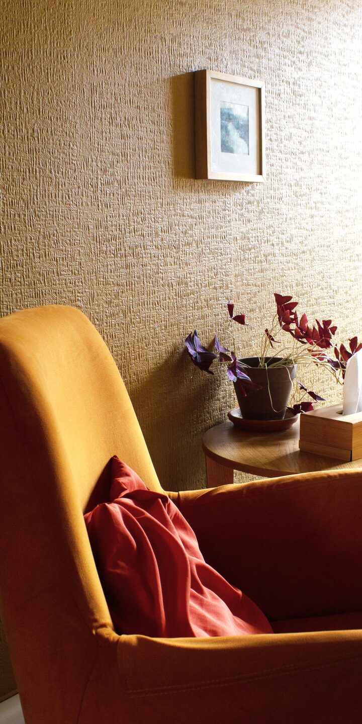 A quiet room detail with armchairs and a side table